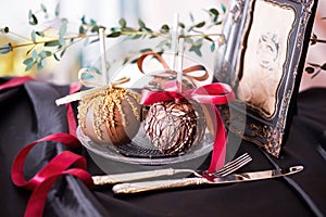 Apples dipped in chocolate on a stick