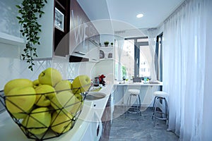 Apples in a fruit bowl in the kitchen