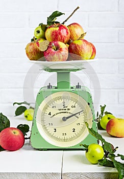 Apples fruit on old vintage scale 1960. One division of 20 grams. photo