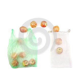 Apples fruits come from plastic bag to reusable recycled mesh net grocery bag, white background, zero waste shopping concept, copy