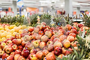Apples and other fruit at a vegetable department in a supermarket