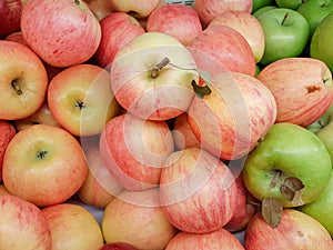 Apples red yellow and green top view in grocery of supermarket