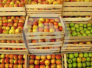 Apples in selling crates on market