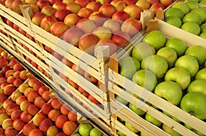 Apples in selling crates on market