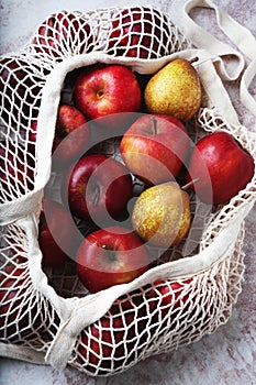 Apples starking in the mesh bag
