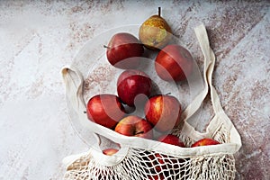 Apples starking in the mesh bag