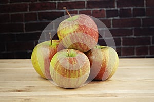 Apples on a wooden table