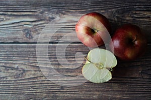 Apples on a wooden table picture from above