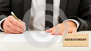 Applicant completing a job application photo