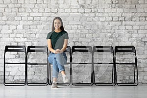 Applicant sit on chair feels confident about upcoming job interview