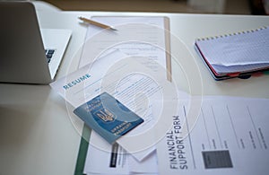 Application forms for Ukrainian refugeeson desk in asylum centre.