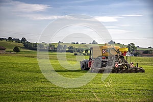 Application of manure on arable farmland with the heavy tractor