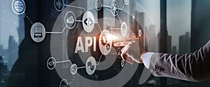Application Programming Interface. API software development tool. Information technology concept. Businessman presses