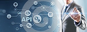 Application Programming Interface. API software development tool. Information technology concept. Businessman presses