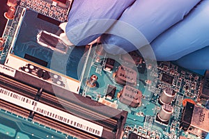 Application of thermal paste on the laptop processor chip for high-quality cooling