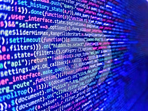 Application web source code on monitor. HTML5 concept macro backdrop in warm colors. Programming Coding with editor colorful