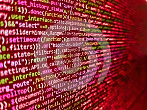 Application web source code on monitor. HTML5 concept macro backdrop in warm colors. Programming Coding with editor colorful