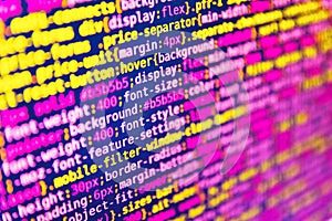 Application web source code on monitor. Programmer working in computer screen. Developer working on source codes on computer at
