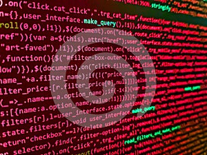Application web source code on monitor. Programming source code abstract screen of software developer. Code on dark background.