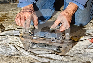 Appling grease to back of brake pad