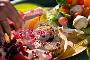 Applying barbecue sauce