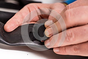 Applying glue on inner tube of a bicycle