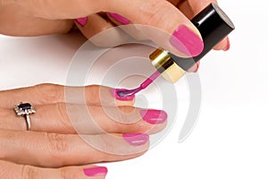 Applying nail varnish photo