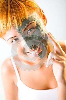 Applying skin care mask