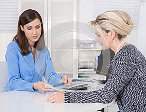 Appointment at a specialist for finance: female customer and adv photo