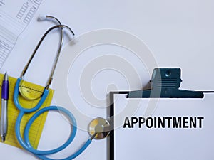 APPOINTMENT text written on paper. Stock photo.