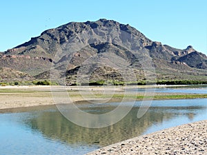 Estuary and Desert  Mountain`s Reflection photo