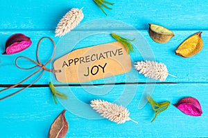 Appreciative joy text on paper tag photo