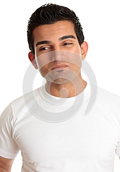 Apprehensive man wincing dilemma problem photo