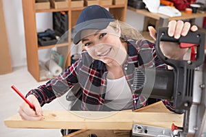 apprentice female carpenter who wheelchair bound