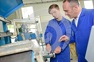 Apprentice talking to instructor