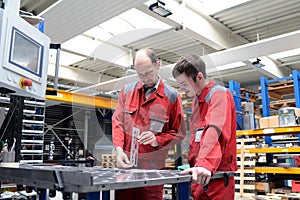 apprentice and trainer in a metalworking company - apprenticeship in the trade