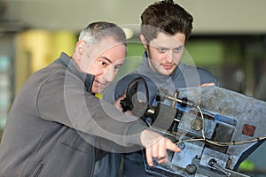 Apprentice working with enginee