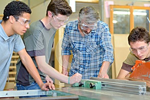 Apprentices learning a trade