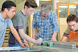 Apprentices learning a trade photo