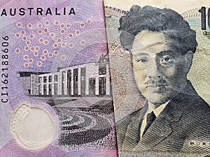 approach to Australian banknote of five dollars and Japanese banknote of 1000 yen