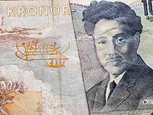 approach to swedish banknote of fifty kronor and Japanese banknote of 1000 yen