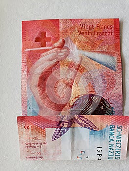 approach to swiss banknote of twenty francs