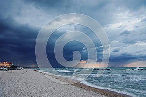 Approaching storm on the beach of Senigallia photo
