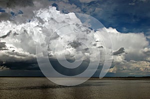 Approaching Storm Clouds Over Water