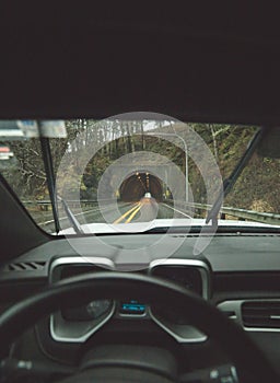 Approaching a tunnel on a rainy highway