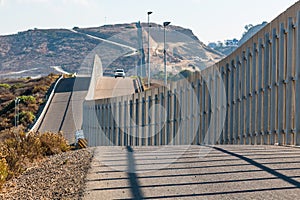 Approaching U.S. Border Patrol Vehicle at U.S./Mexico Border Wall