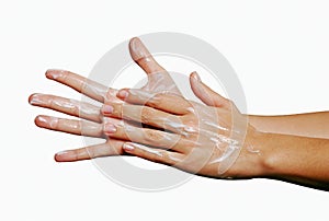 Appying body skin cream on hands