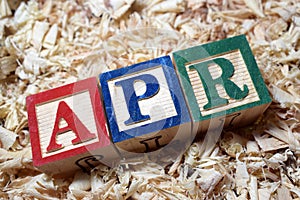 APR annual percentage rate acronym on wooden block photo