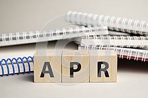 apr acronym on wood block cubes on wooden table over light blue gradient background, Frequently asked questions, Business customer