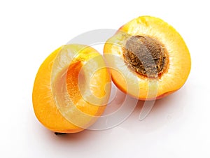 Apricot cutting in half with stone close-up